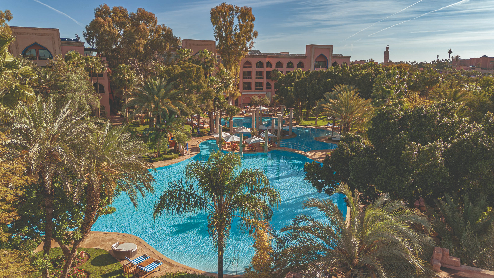 This image shows the beautiful view of the pool at Palace Es Saadi in Marrakech